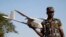 FILE - A soldier from the Uganda People's Defense Forces (UPDF) gives a demonstration on a Raven unmanned aircraft at the Kasenyi Special Forces Group barracks 40km (25 miles) south west of capital Kampala.