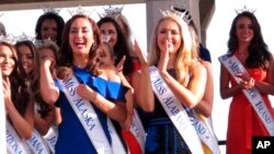 FILE - Contestants attend a welcoming ceremony for the Miss America competition in Atlantic City, N.J., Aug. 30, 2017. 