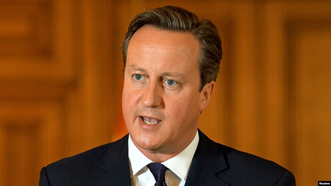 Britain's Prime Minister David Cameron makes a statement to the media following the killing of Scottish aid worker David Haines, at Number 10 Downing Street in London, Sept. 14, 2014.