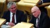 John Swinney, right, of the Scottish National Party attends the Scottish Parliament in Edinburgh on April 30, 2024. Swinney has said he is considering running for first minister now that Humza Yousaf has announced his resignation.