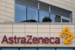 A general view of AstraZeneca offices and the corporate logo in Cambridge, England, July 18, 2020.