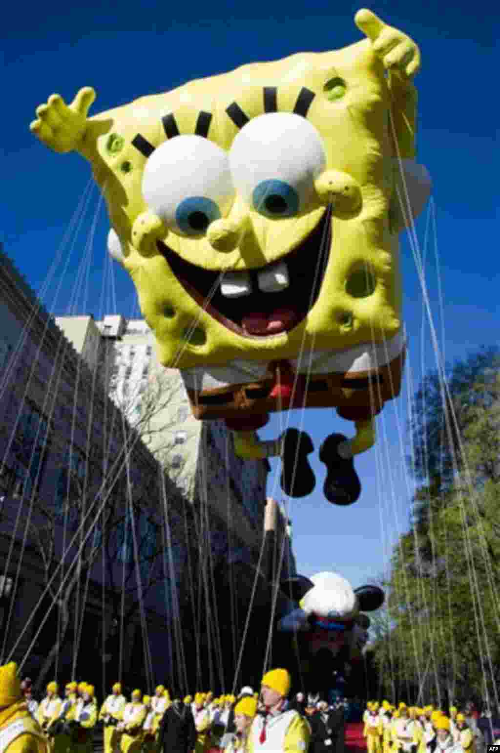 The SpongeBob SquarePants balloon floats in the Macy's Thanksgiving Day Parade in New York, Thursday, Nov. 24, 2011. (AP Photo/Charles Sykes)