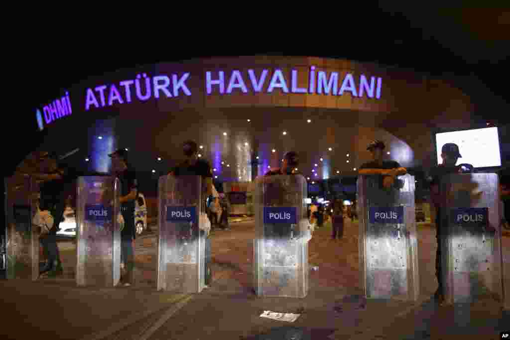 Turkish police block the entrance to Istanbul's Ataturk airport early Wednesday, June 29, 2016. 