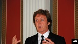 Former Beatle Paul McCartney speaks at a news conference before the White House event. (Washington, DC)