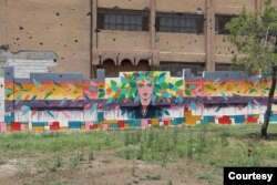 A mural said to be representing diversity and tolerance is seen on wall at a park in Raqqa, Syria, June 25, 2019. (Courtesy photo)