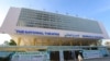 People arrive at the newly rebuilt National Theater, to watch the first film festival held in the capital of Mogadishu, Somalia, Sept. 22, 2021