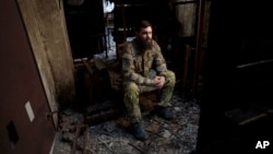 Ukrainian Lt. Col. Ihor Benzeruk, who survived explosions at the Russian-controlled Olenivka prison two years ago, is pictured in Lyman, Ukraine, July 11, 2024. Though he survived, "this day remains as the day my comrades were executed," he said.