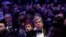 FILE - British author Laurie Penny (L) and Republican U.S. Senator Roy Blunt listen to author and historian Ron Chernow's speech at last year's White House Correspondents' Dinner, in Washington, April 28, 2019.