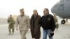 Defense Secretary Leon Panetta (R) talks with U.S. Ambassador to Afghanistan James B. Cunningham (C) and Marine General John R. Allen, commander of International Security Assistance Force, upon arriving at Kabul International Airport, December 12, 2012.