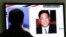 Stanovnik Južne Koreje gleda vesti na televiziji o Amerikancu korejskog porekla Kenetu Beu. 
