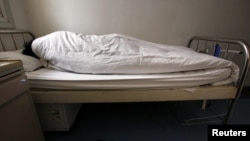 An infected patient's bed at the HIV/AIDS ward of Beijing YouAn Hospital, Dec. 1, 2011. 