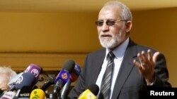 The supreme guide of Egypt's Muslim Brotherhood Mohamed Badie speaks during a news conference at the Brotherhood's main office in Cairo, Dec. 8, 2012. 