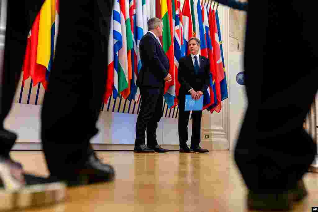 U.S. Secretary of State Antony Blinken, right, accompanied by Secretary-General of the Organization for Economic Cooperation and Development (OECD) Mathias Cormann, of Australia, speaks at the OECD headquarters in Paris.