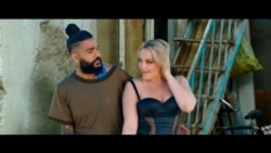 FILE - This photo provided by AZ Films shows California-based Iranian pop singer Sasy with American adult film actress Alexis Texas in the music video for "Tehran Tokyo," Feb 26, 2021, in Los Angeles.