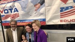 Voter Nelly Tobon and her family support Senator Elizabeth Warren because “she thinks like me.” (Carolyn Presutti/VOA)