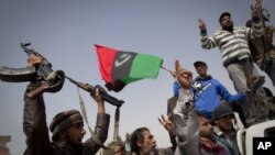 Des rebelles après avoir repris le controle d'Ajdabiya, Samedi 26 mars 2011