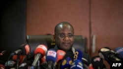 Senegalese Magistrate and President of the National Commission for the Enumeration of Votes, Amady Diouf announces the results of the nation's 2024 presidential election, at the Palais de Justice in Dakar, on March 27, 2024.