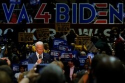 FILE - Democratic U.S. presidential candidate and former U.S. Vice President Joe Biden speaks during a campaign event at Booker T. Washington High School in Norfolk, Virginia, March 1, 2020.