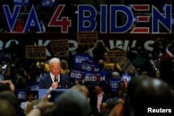 FILE - Democratic U.S. presidential candidate and former U.S. Vice President Joe Biden speaks during a campaign event at Booker T. Washington High School in Norfolk, Virginia, March 1, 2020.