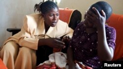 Apollonie, a Congolese counselor, speaks with a rape victim in the HEAL Africa hospital in Goma, (File photo).