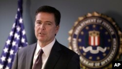 FILE - FBI Director James Comey is seen during a news conference.