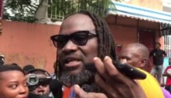 Former Senator Antonio Cheramy addresses the protesters in Port-au-Prince, Haiti, Dec. 10, 2020. (Renan Toussaint/VOA)