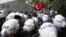 Turkish riot police try to stop ethnic Uighurs from marching to the Chinese Consulate during a protest against China, in Istanbul, Turkey, July 21, 2011.