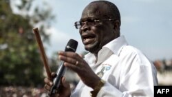 FILE - Then-interim president of the Congolese Movement for Democracy and Integral Development (MCDDI), Guy-Brice Parfait Kolelas, addresses his supporters in Brazzaville, March 17, 2016. 