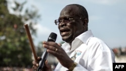 FILE - Then-interim president of the Congolese Movement for Democracy and Integral Development (MCDDI), Guy-Brice Parfait Kolelas, addresses his supporters in Brazzaville, March 17, 2016. 