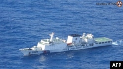 This handout aerial photo taken on January 13, 2025 and released by the Philippine coast guard on Jan. 14 shows Chinese coast guard ship 5901 sailing in the South China Sea.