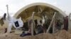 Newly arrived Syrian refugees are seen at Ceylanpinar refugee camp, Sanliurfa province, Turkey, November 10, 2012. 