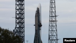 A Blue Origin New Glenn rocket stands ready for its inaugural launch at the Cape Canaveral Space Force Station in Cape Canaveral, Florida, Jan. 13, 2025. 