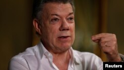 El presidente colombiano, Juan Manuel Santos, se disculpó ante sobrevivientes del Partido Unión Patriótica por los asesiantos de miembros de ese partido en la década de 1980.