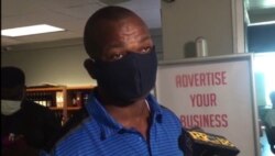 This passenger, who was wearing a mask, said he is not afraid of catching the coronavirus. (VOA Creole/Yves Manuel)