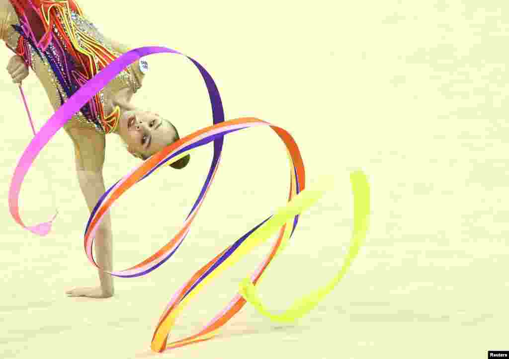 Anastasiia Salos of Belarus competes during the Rhythmic Gymnastics Individual Ball Final in Varna, Bulgaria.