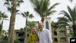 US Secretary of State Hillary Clinton meets with Australia's Foreign Minister Kevin Rudd at the G20 foreign ministers summit in Los Cabos, Mexico, February 20, 2012.