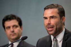 FILE - Rene Bruelhart, president of the Vatican Financial Information Authority, right, and Tommaso Di Ruzza, director of the Vatican Financial Information Authority, talk to the media at the Vatican, April 28, 2016.