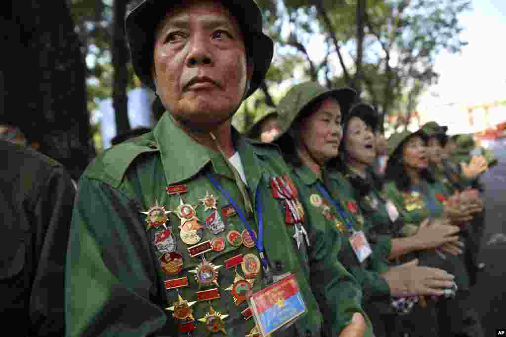 Vietnamese veterans gather for a parade celebrating the 40th anniversary of the end of the Vietnam War which is also remembered as the fall of Saigon, in Ho Chi Minh City, Vietnam.