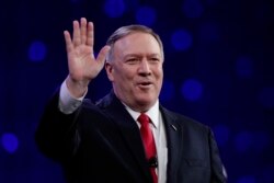 FILE - Secretary of State Mike Pompeo waves to the crowd before speaking at the 101st National Convention of The American Legion in Indianapolis, Aug. 27, 2019.