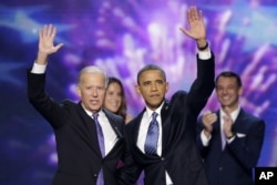 FILE - Vice President Joe Biden and President Barack Obama wave to the delegates at the conclusion of President Obama's speech at the Democratic National Convention, September 6, 2012.
