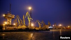 FILE - Cranes are seen in the Azov Sea port of Mariupol, Ukraine, Dec. 2, 2018.