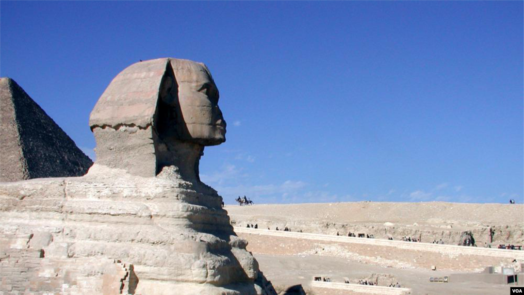 Sphinx, Abul Hawl in Arabic, the enormous statue with a man's head and a lion's body standing guard over the pyramids in Giza, outside Cairo, Egypt. (Diaa Bekheet/VOA)