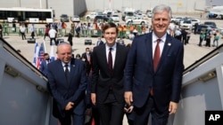 Israeli National Security Advisor Meir Ben-Shabbat, left, U.S. President Donald Trump's senior adviser Jared Kushner, center, and U.S. National Security Advisor Robert O'Brien, right, board the Israeli flag carrier El Al's airliner as they fly to UAE.