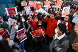 Protesters from Myanmar residing in Japan rally against Myanmar's military, in Tokyo, Feb. 3, 2021.