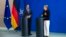 German Chancellor Angela Merkel (R) and NATO Secretary General Anders Fogh Rasmussen attend a news conference after talks at the Chancellery in Berlin, July 2, 2014. 
