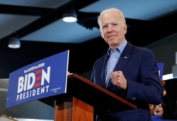 Democratic presidential candidate former Vice President Joe Biden gestures as he speaks during a caucus night event, Feb. 22, 2020, in Las Vegas.