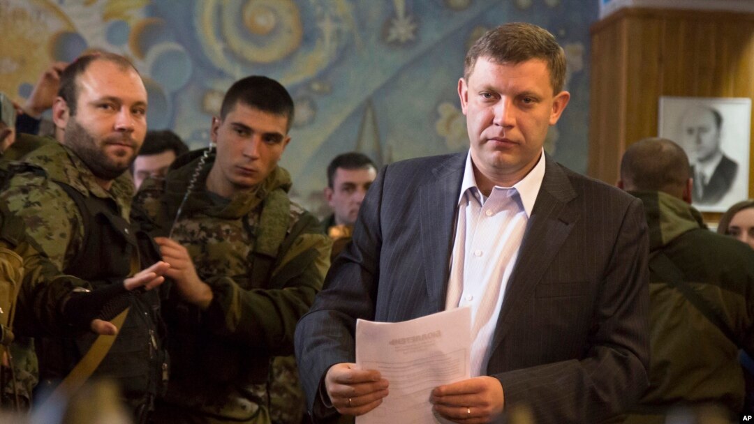 FILE - Pro-Russian rebel leader Alexander Zakharchenko is seen approaching a ballot box in separatist-organized elections in the city of Donetsk, eastern Ukraine, Nov. 2, 2014.