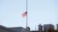 FILE - The flag over the White House is lowered to half-staff.