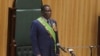 FILE — Zimbabwean President Emmerson Mnangagwa prepares to deliver his speech in parliament during his State of the Nation address in Harare, on October 3, 2023