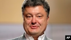 Kandidat presiden Ukraina Petro Poroshenko dalam sebuah jumpa pers di Kyiv, Ukraina (26/5).